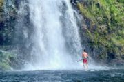 SUP under the Kulaniapia Fals in Hilo, Hawaiʻi