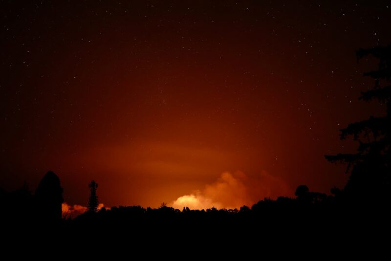 Kīlauea's eruption plume illuminated during the early morning hours of June 3, 2024
