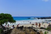 people on the beach of Kua Bay